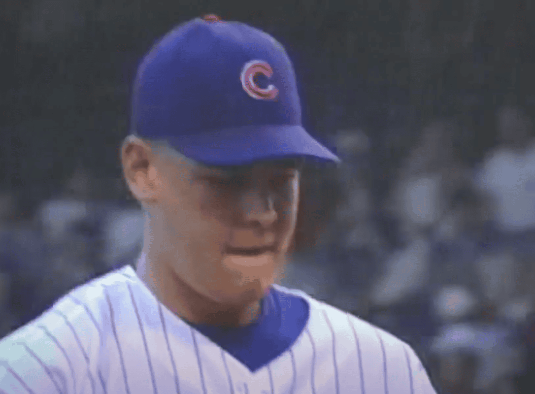 Iconic showdown between Greg Maddux and Kerry Wood, showcasing pitching mastery.